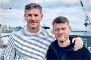 Head shot of Ben Edwards and Guy Hobbs standing together