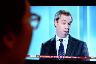 Nigel Farage grimaces on a live election TV debate
