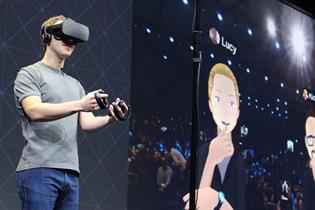 Meta founder and CEO Mark Zuckerberg displays Facebook's VR console