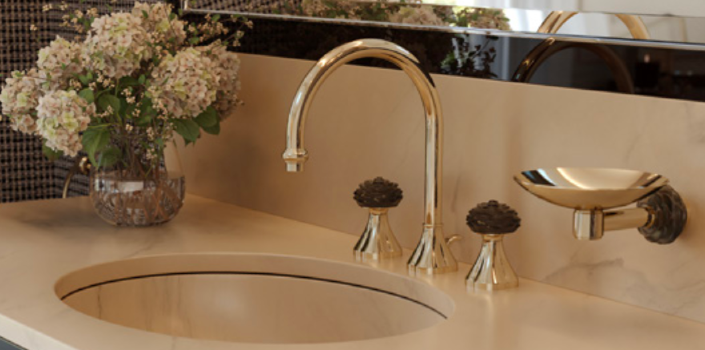 basin showing crystal flower taps and soap stand