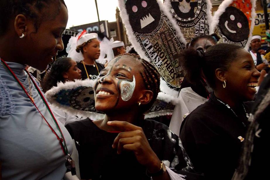 Photo of a boy in a busy crowd at Nottinghill Carnival