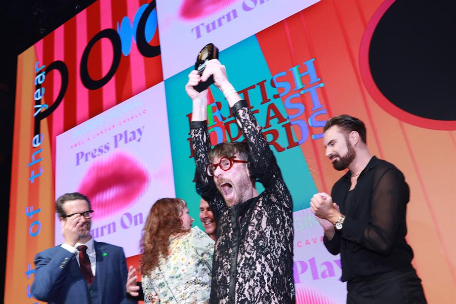 Adam Zmith, producer of Press Play, Turn On, accepts the Podcast of the Year award
