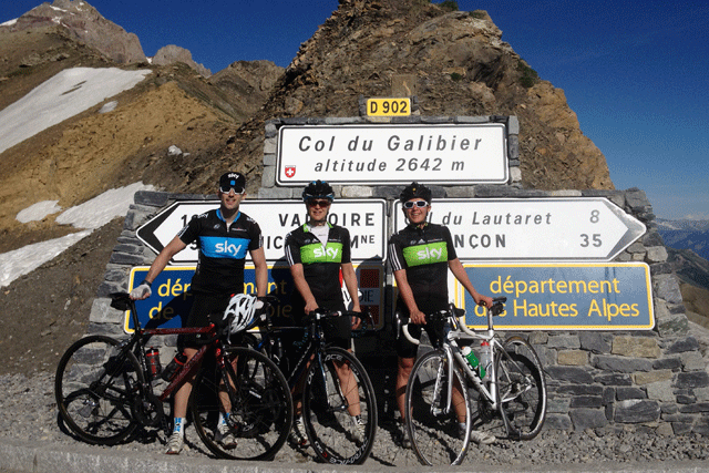 On track: News International riders complete a stage of the Tour de France