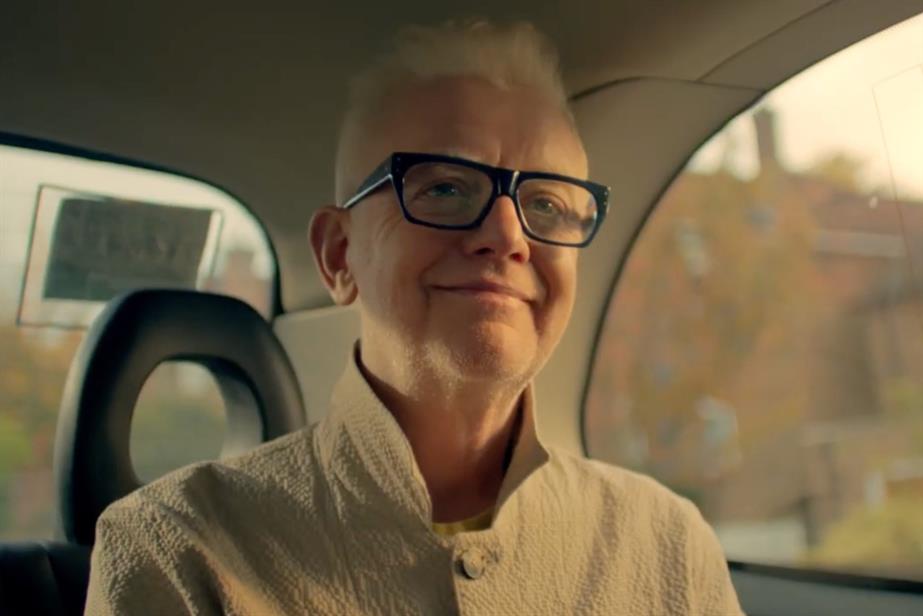 Chris Evans smiles in ad for Chris Evans Breakfast Show on Virgin Radio UK