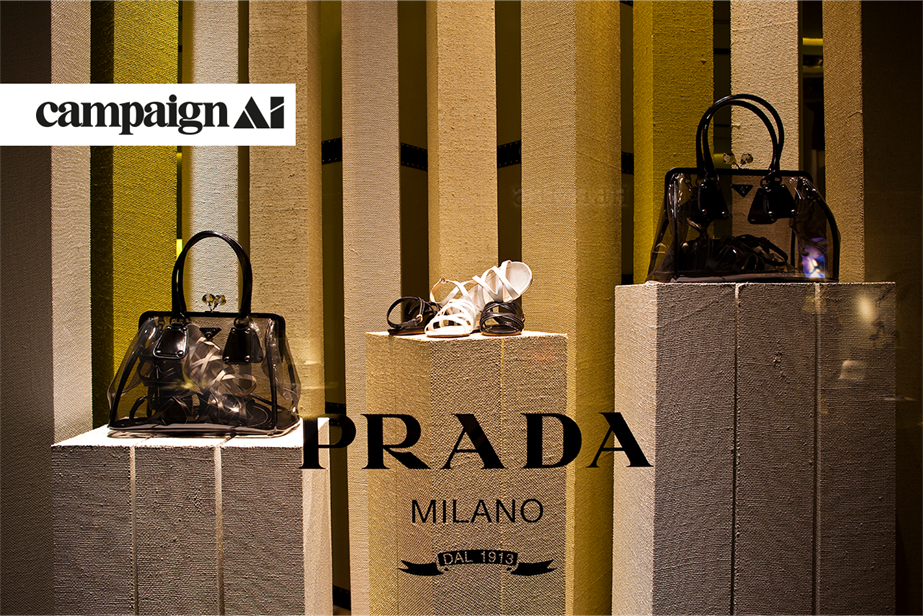 Prada handbags and shoes in a shop display window