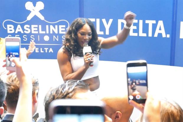 Tennis ace Serena Williams performs at Delta Air Lines' karaoke event at the W Hotel in London