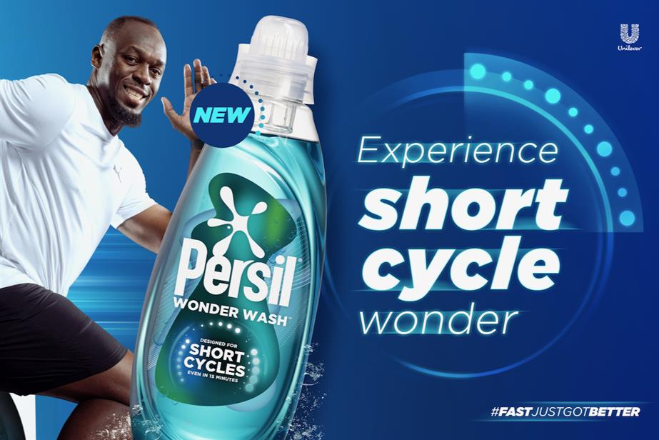 A grinning Usain Bolt in a sprinting pose, promoting Persil's new Wonder Wash liquid detergent