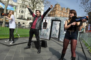 Fans practise target shooting at the event