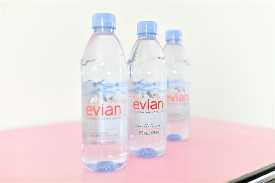 Three bottles of Evian water