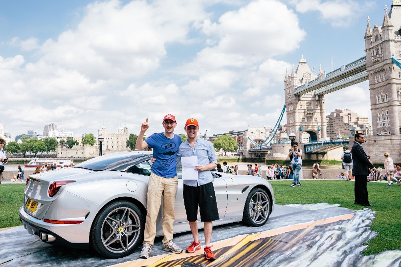 Winners of the Shell and Ferrari treasure hunt celebrate