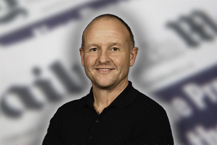 Headshot of Guy Edmunds. 
