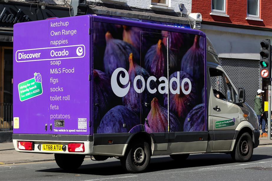 Pictured: An Ocado delivery truck driving through London