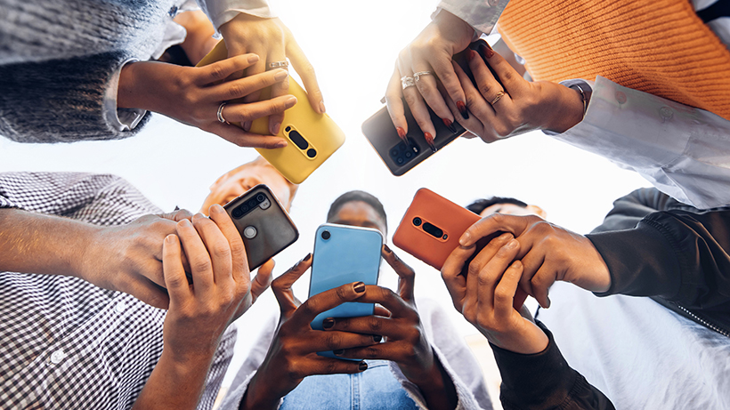 circle of people on phones