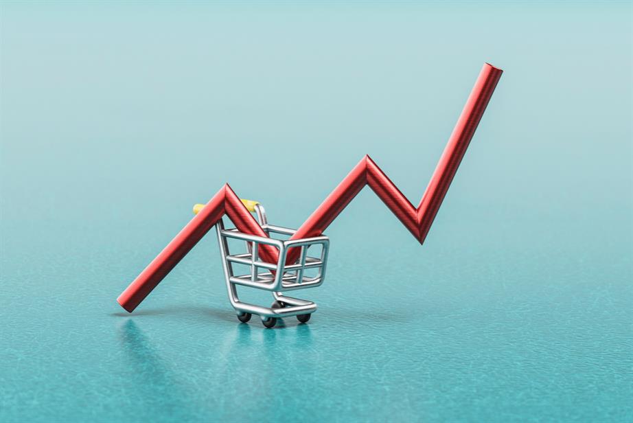 A shopping trolley carrying a graph line representing growth