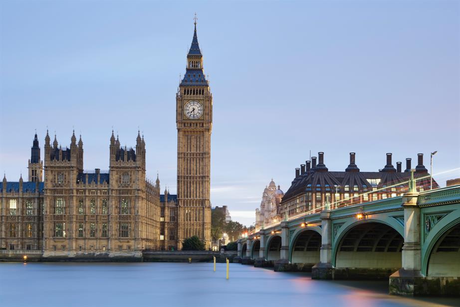 A colour photo of the Palace of Westminster take from the south side of the Thames