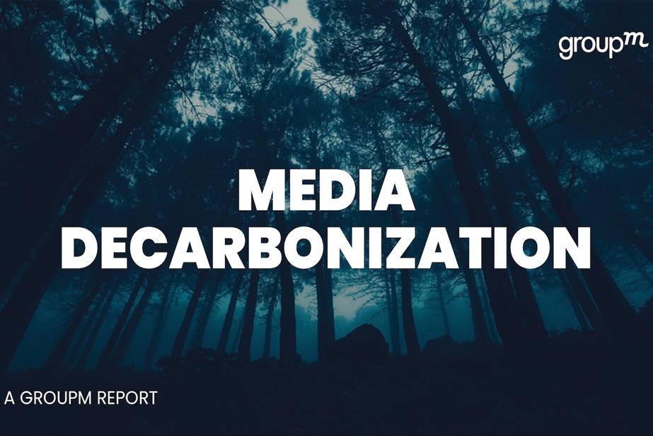 An image of a forest with the words 'Media Decarbonisation' and 'A Group M report'