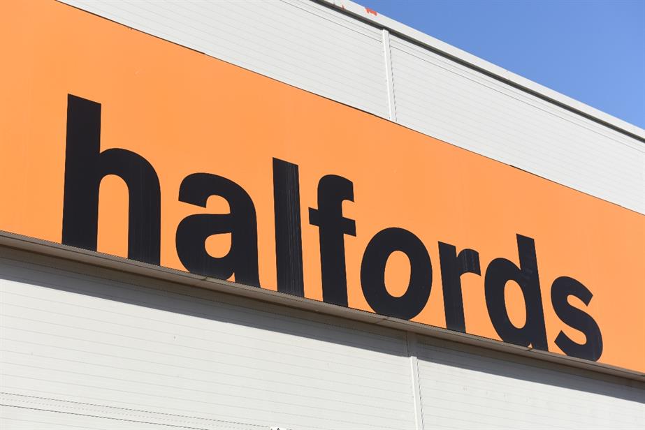 Halfords logo on the side of a Halfords store