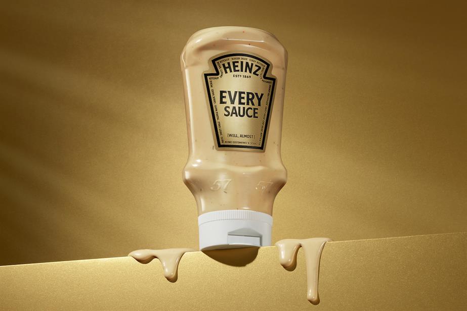 A bottle of Heinz's Every Sauce, with dollops of the contents dripping off the side of a shelf