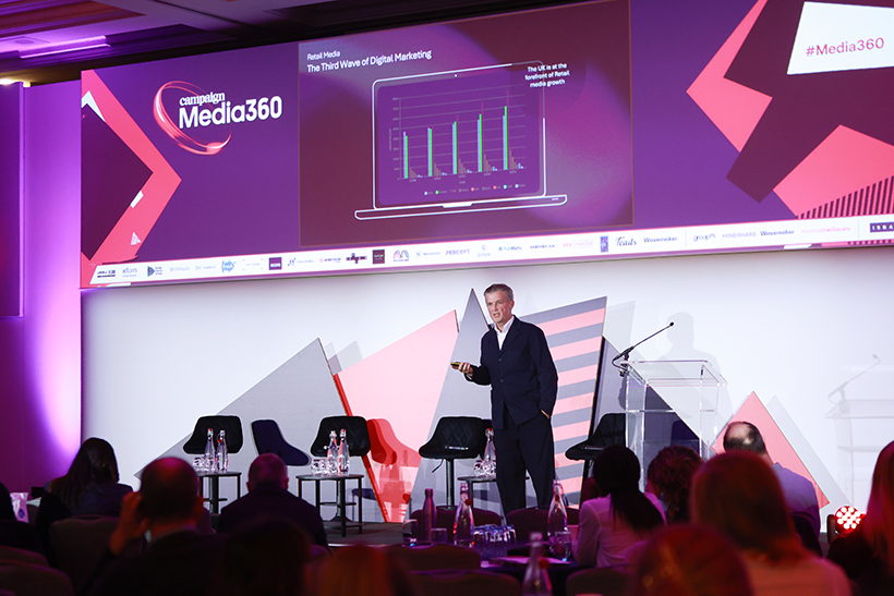 Man presenting on stage