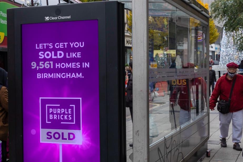A Purplebricks ad at a bus stop saying: "Let's get you sold like 9,561 homes in Birmingham"