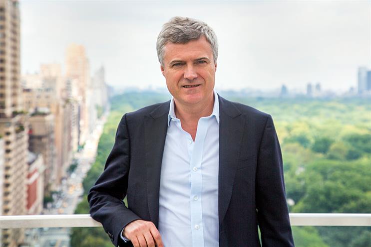 WPP CEO Mark Read standing on a balcony, the London skyline out of focus in the background