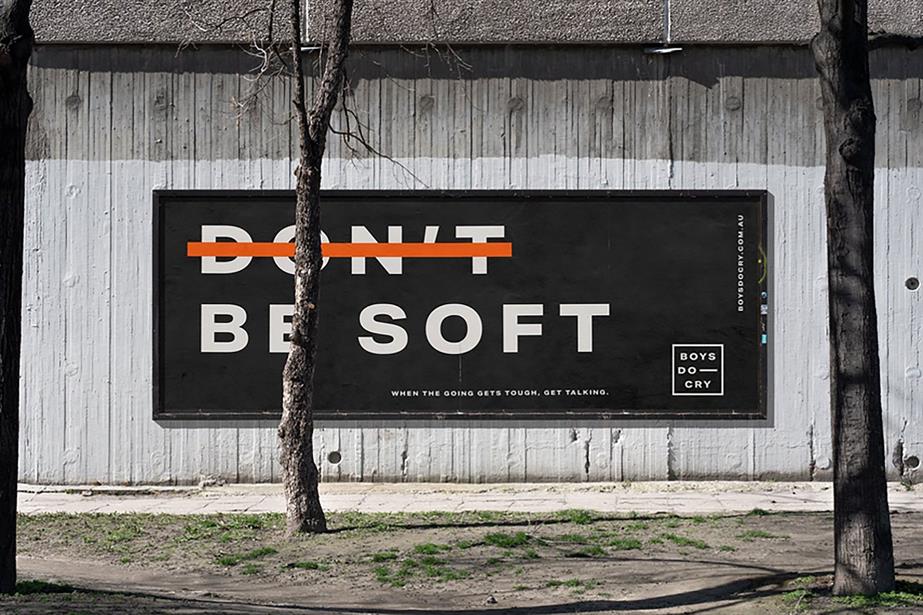 Billboard ad with 'don't be soft' has 'don't' crossed out