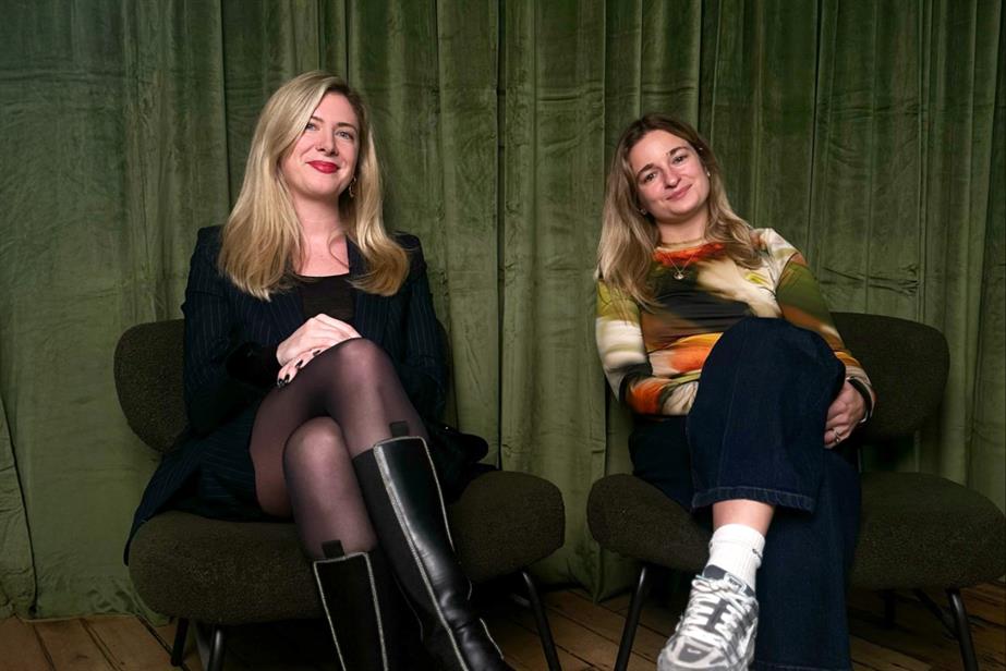 Lucy Ducker and Emily Lyddon-Towl sitting together