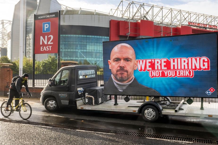 A digital billboard outside Old Trafford football stadium