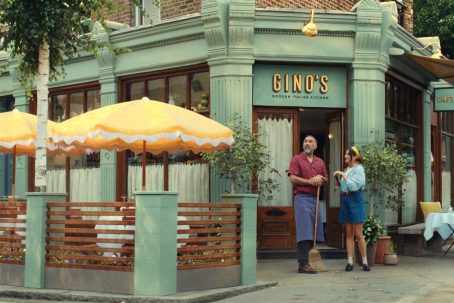 people standing in front of a restaurant