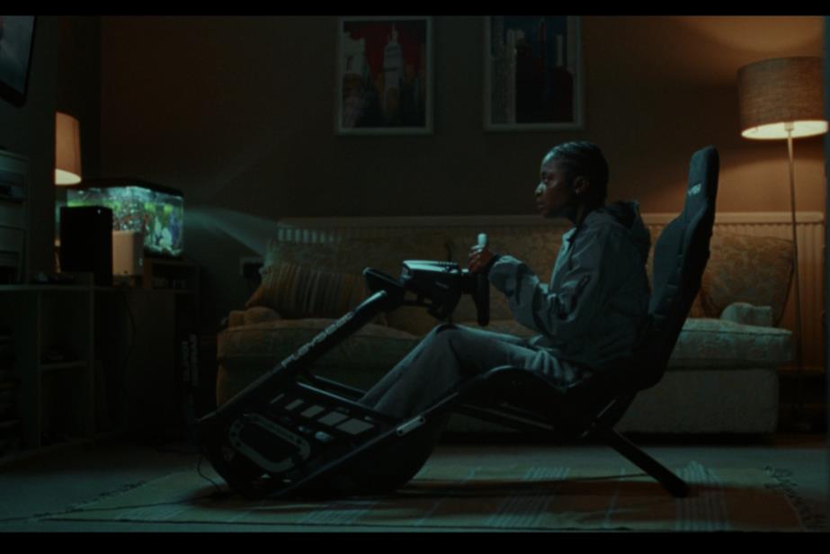 person sitting in gaming chair