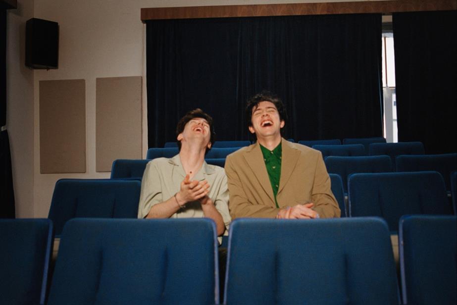 Couple sitting together in a theatre