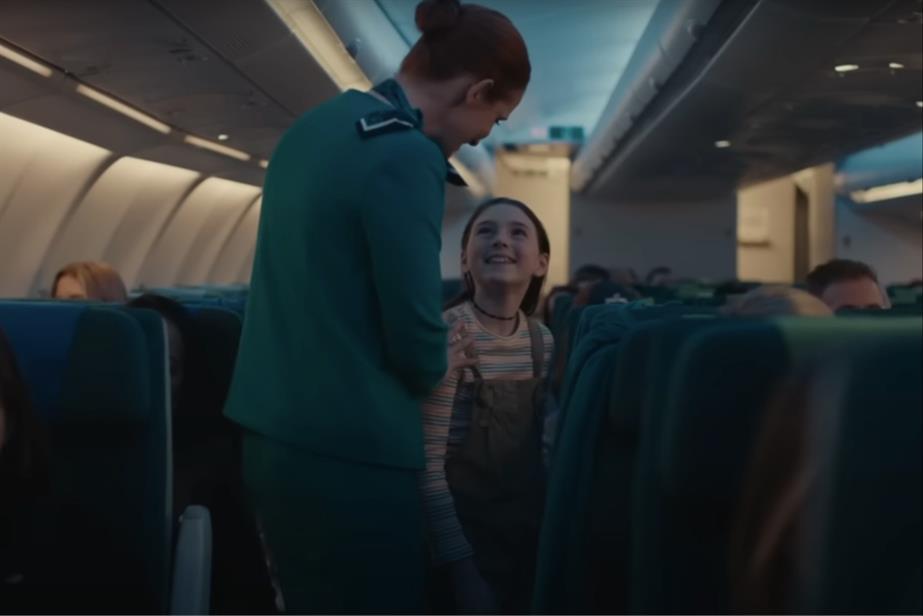 woman and girl on a plane
