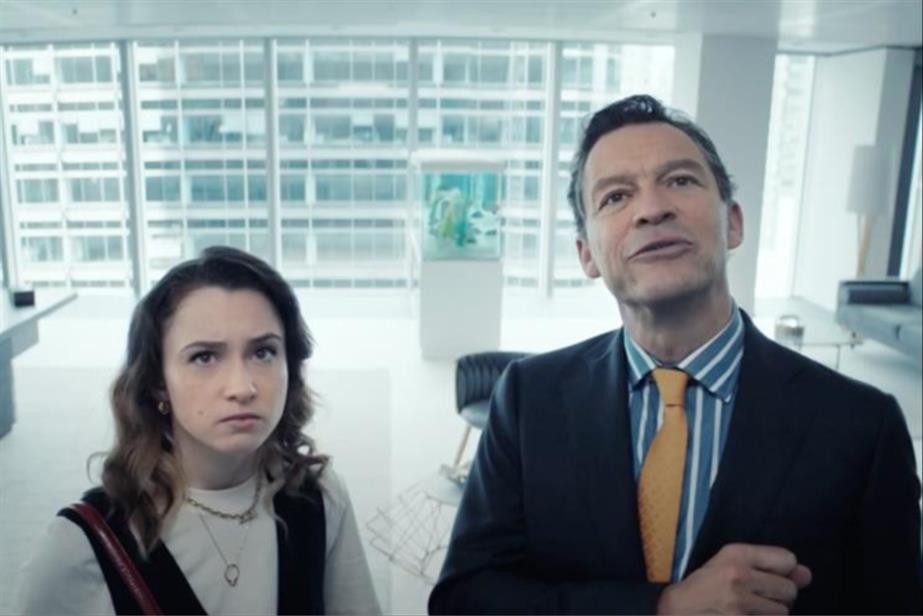 A woman and a man standing next to each other