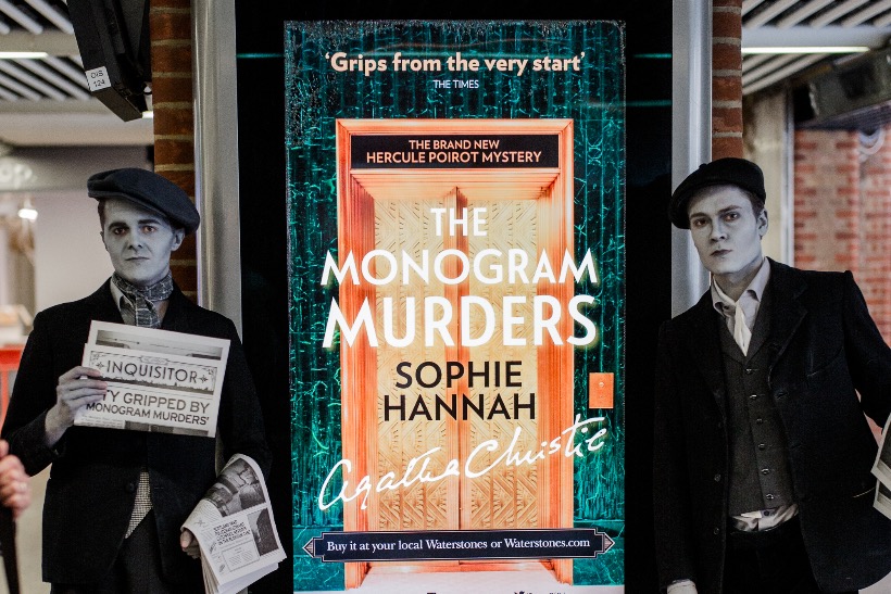 'The Monogram Murders': black and white newspaper boys promoting the new Hercule Poirot novel