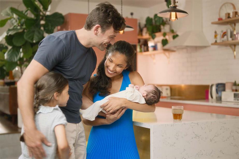 Pregnacare ad of family and new born baby