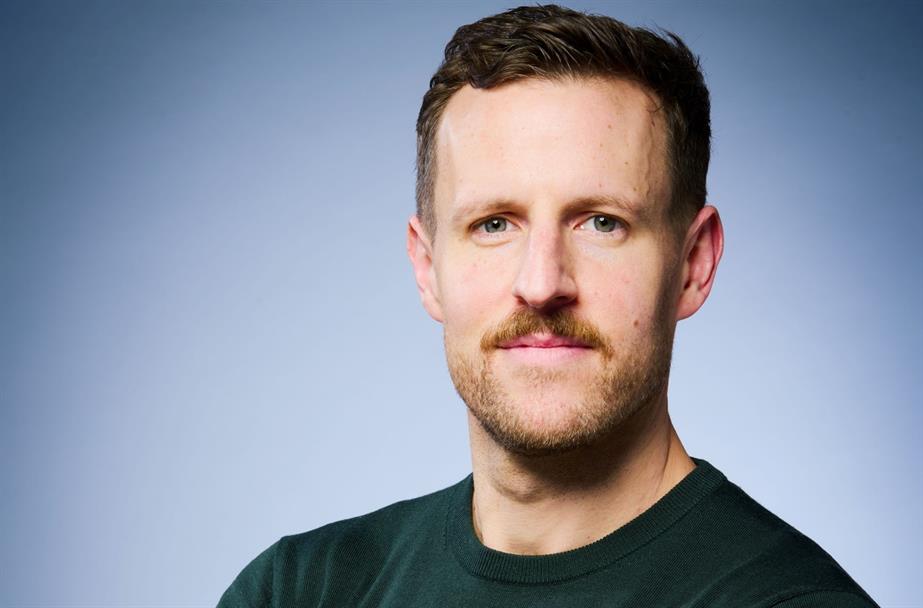 Headshot of Ryan Uhl.