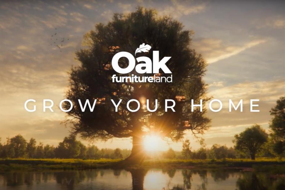 An ad still from Oak Furnitureland's latest TV ad: a giant oak set against a sunset and the words 'Grow your home'