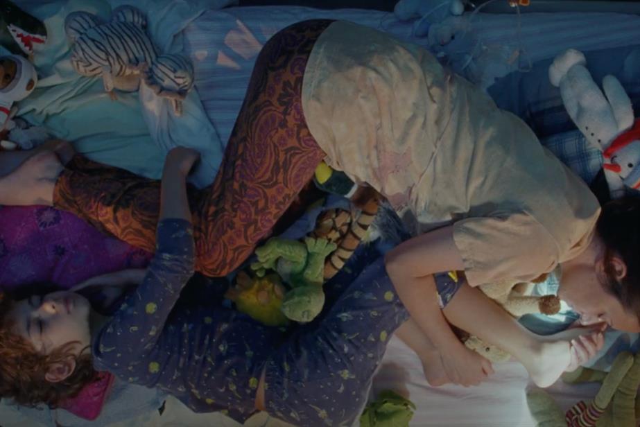 A boy and his dying mother sleeping