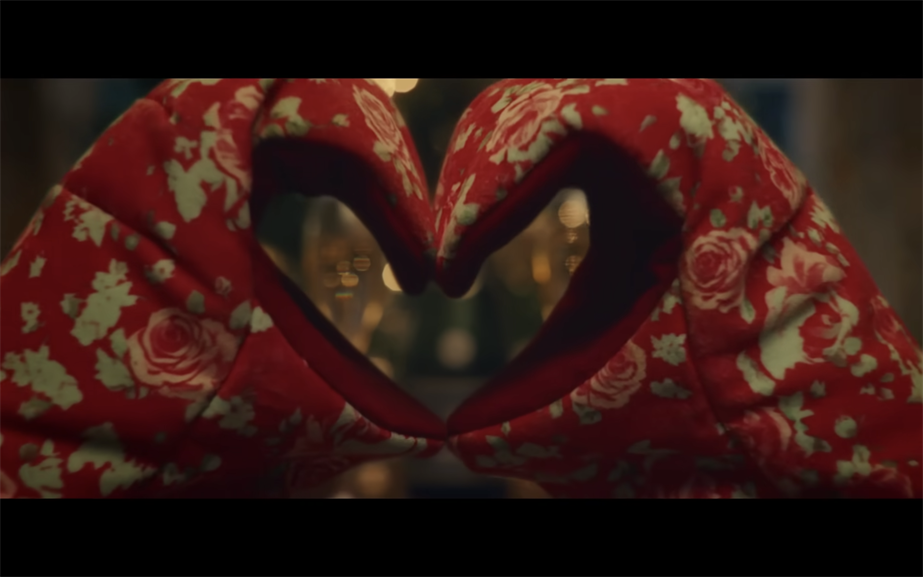 Two oven gloves put together to make a heart shape