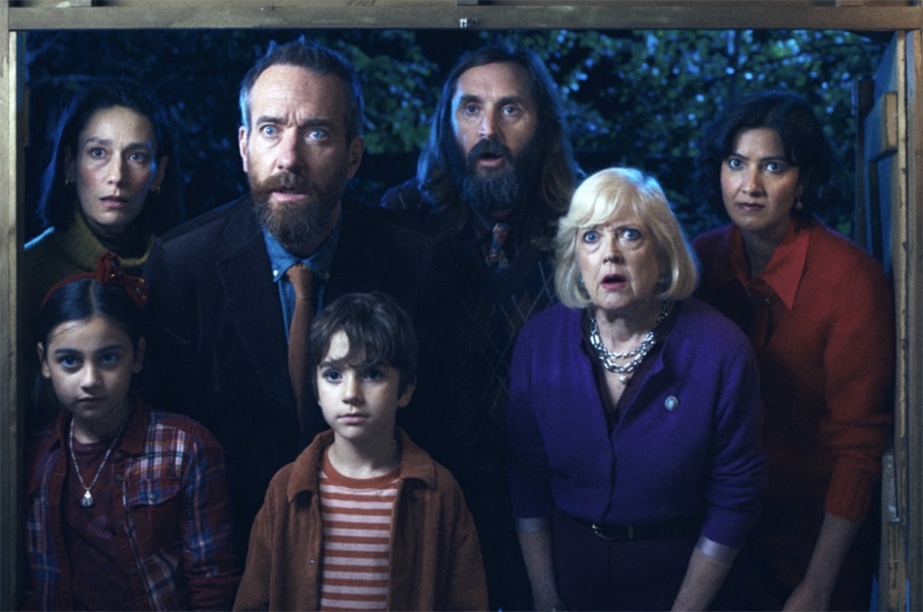 a family looks alarmed on the doorstep