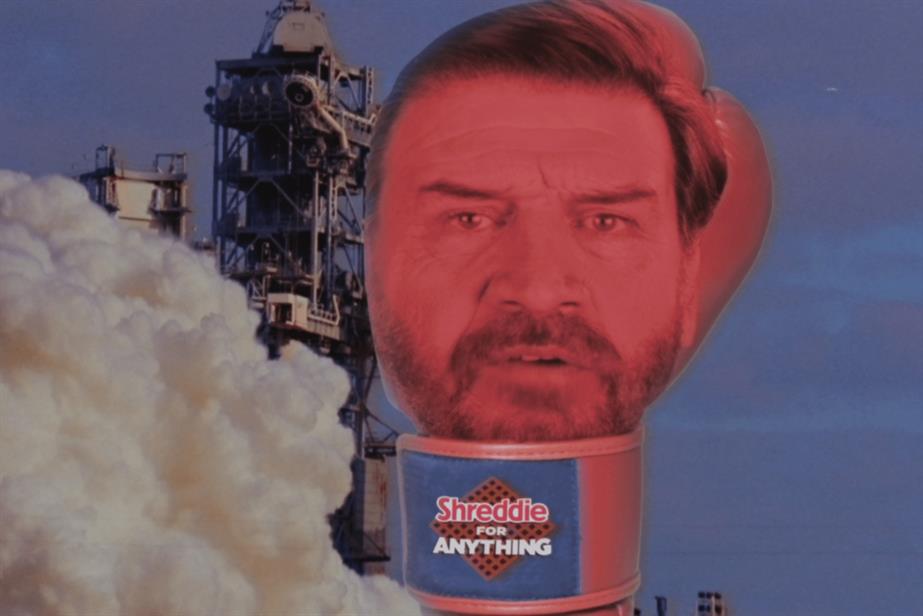 Nick Knowles face on a giant rocket boxing glove