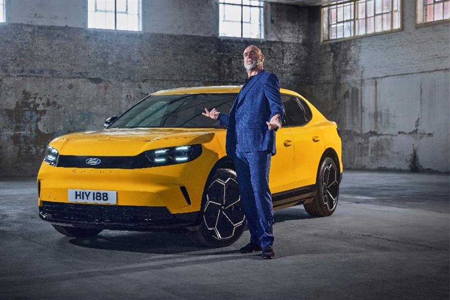 Eric Cantona stands by the new Ford Capri EV model