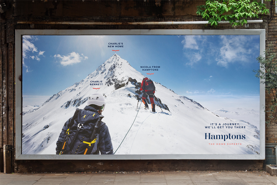 two people hiking a snowy mountain