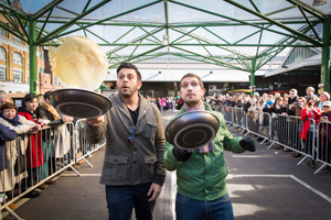 Adam Richman joins in Better Bankside's pancake day race
