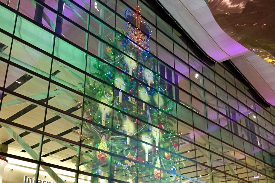 The 90-foot interactive Christmas tree graphic at Heathrow Airport