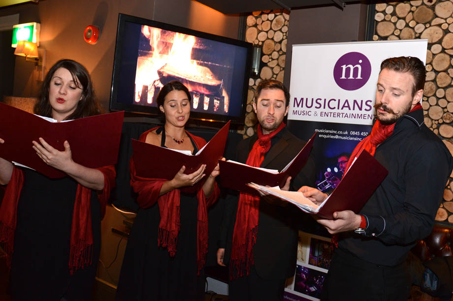 Christmas carolers at LNL's Christmas showcase
