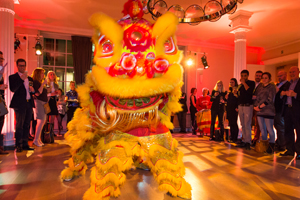 A cheeky lion performed at the RSA House's 'year of the horse' event