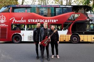 Competition winners Violet Bones in front of Fender-inspired bus