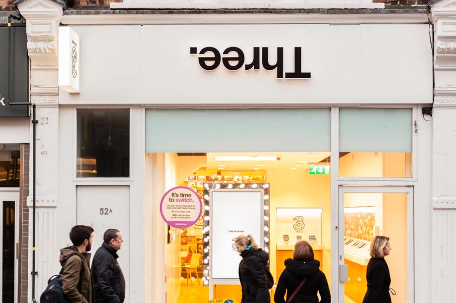 Upside-down signs at Three's Clapham store