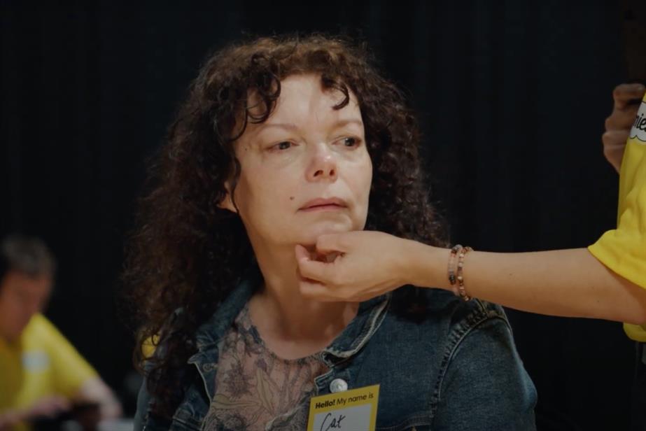 Someone tickling woman's chin